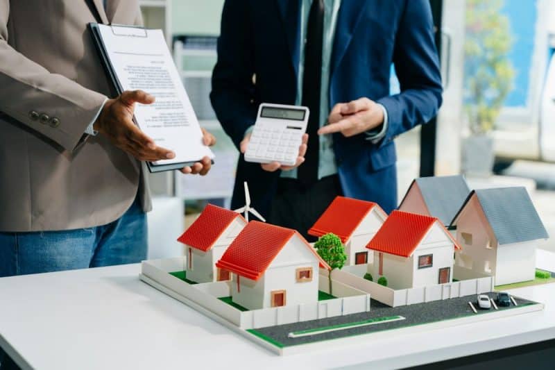 balancing the property sector The real estate agent is explaining the house