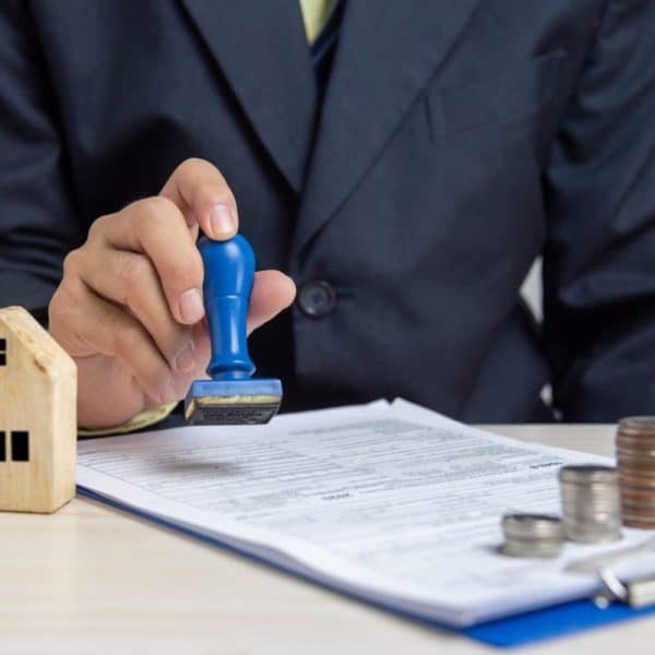 Buying and selling real estate or borrowing money, bank loans, approved investments.