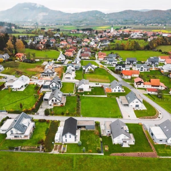 Drone view of new family homes in suburban area