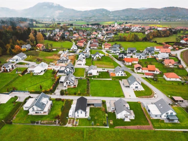 Drone view of new family homes in suburban area