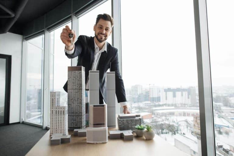 Real estate manager homeowner businessman banker salesman caucasian successful man sell house