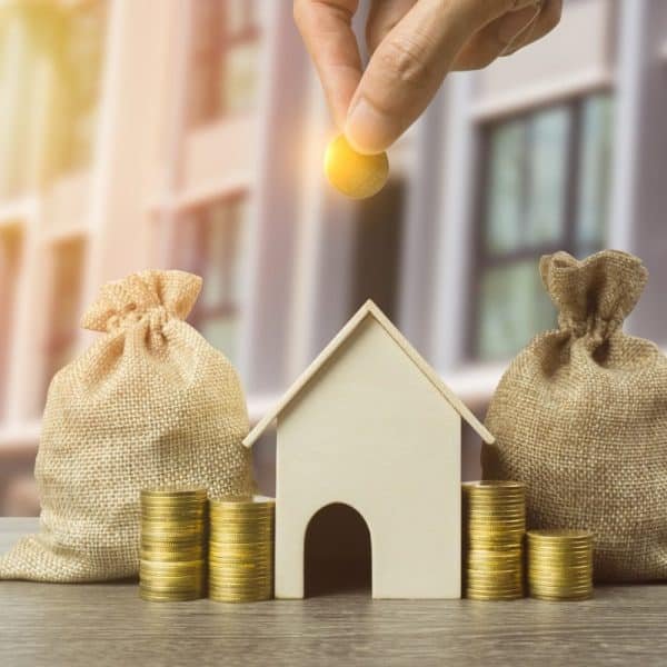 Saving money, home loan, mortgage, a property investment for future concept