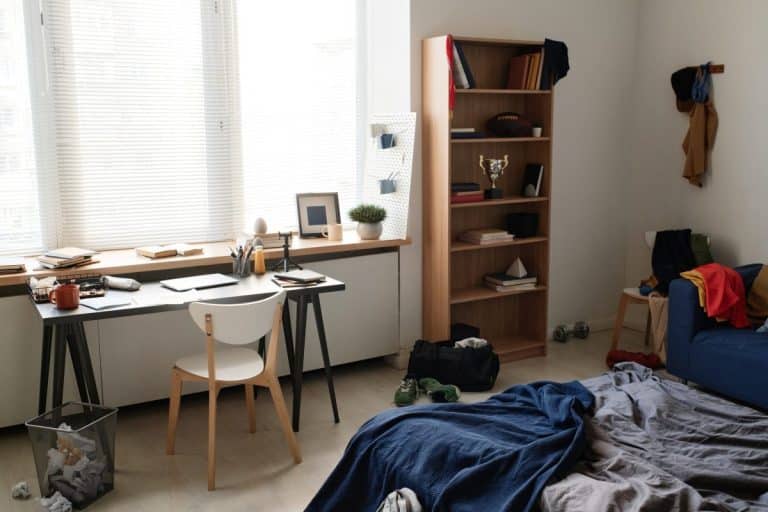 Students room with bed and desk