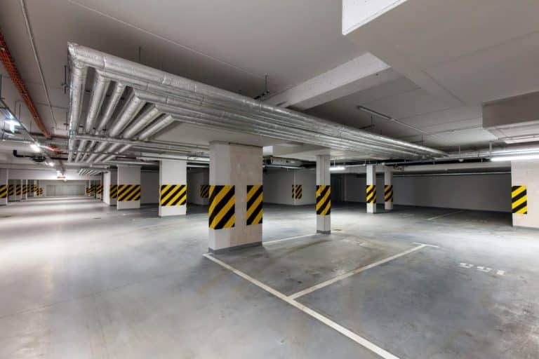 Underground empty parking garage. Modern urban space