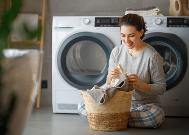 woman is doing laundry
